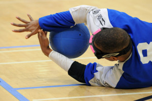 A goalball player makes a save
