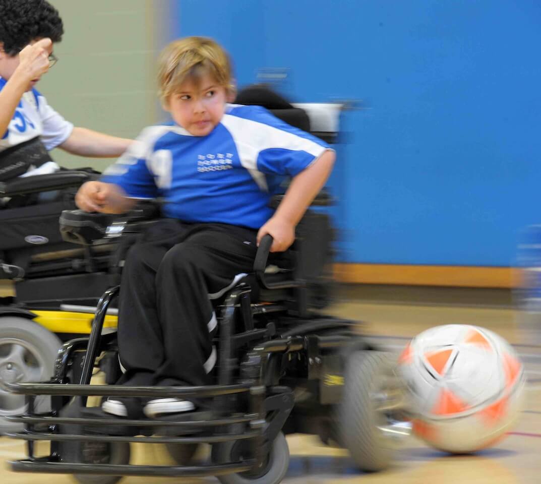 Cosmo is a blur during a power soccer game