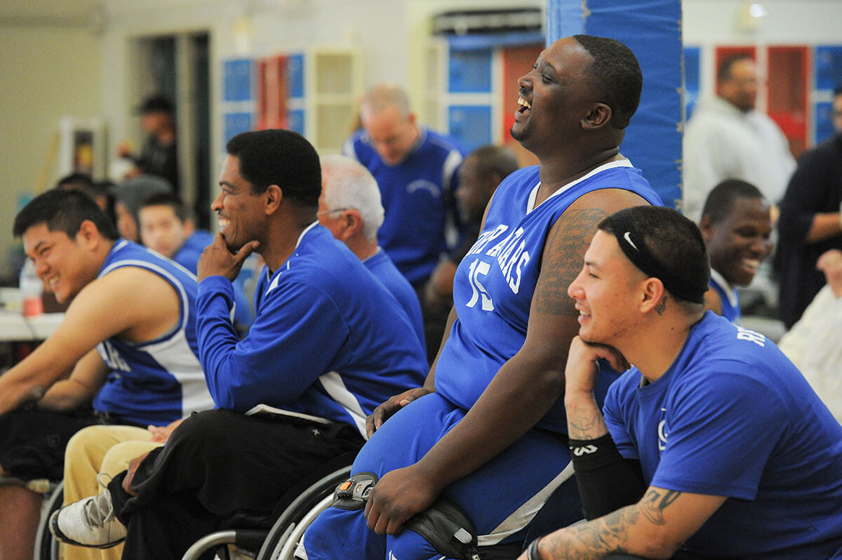 Members of the BORP All Stars share a laugh during the 2014 Hoops Classic