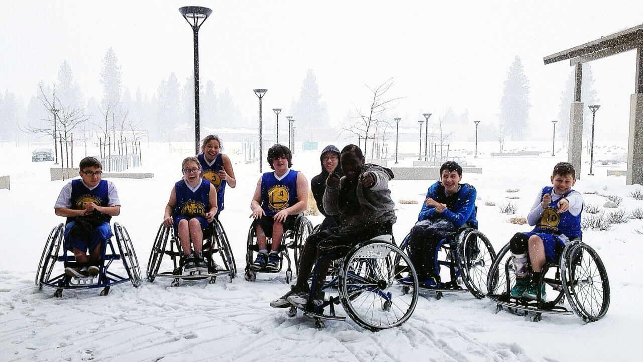 Members of the 2014 BORP Jr. Road Warriors pose a photo in the snow