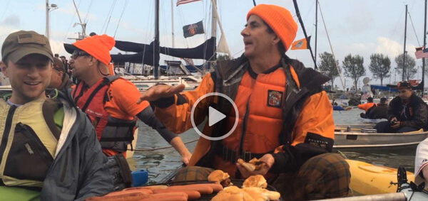 BORP Cycling Coordiantor Greg Milano and BORP cyclist Jorge Alvarado on a kayak in AT&T Park's McCovey Cove
