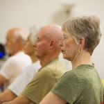 Five members of a Yoga for Seniors class in profile