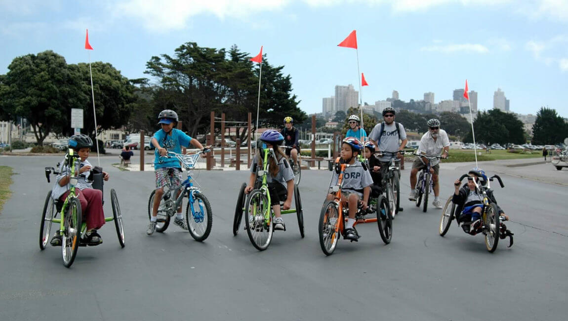 A group of youth cyclists and parents in San Francisco