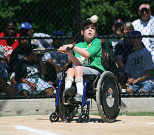 A Challenger baseball player gets ready to swing at a pitch