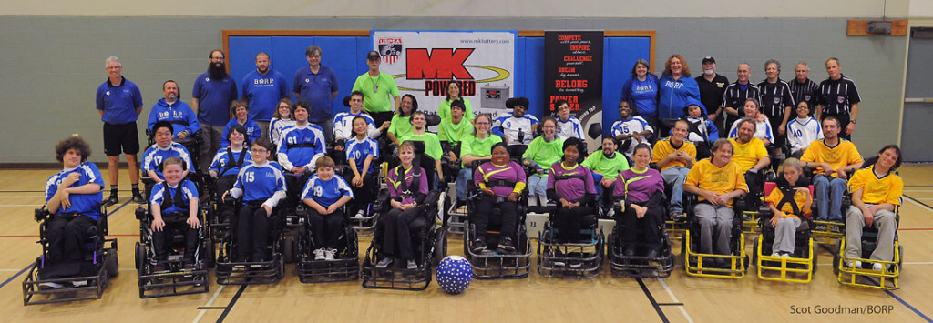 Group photo of power soccer teams at January 11, 2014 tournament