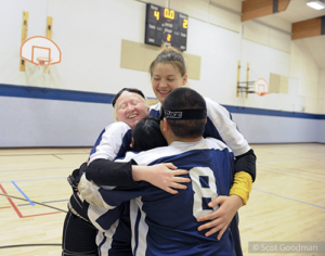 Cal Bears embrace after winning the tournament