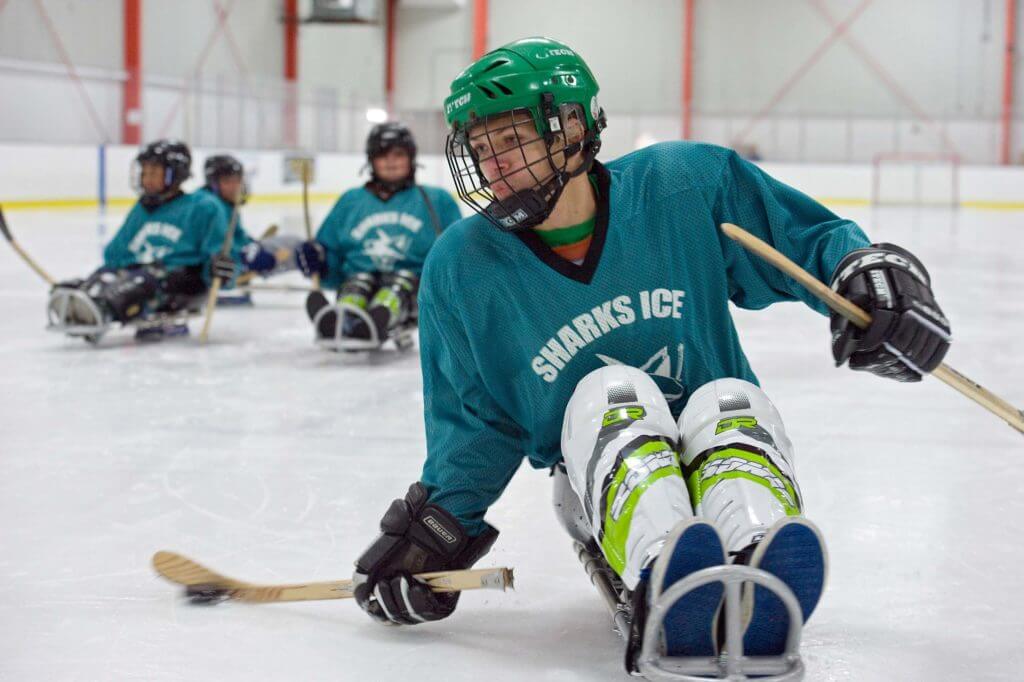 Sled hockey athelete in game