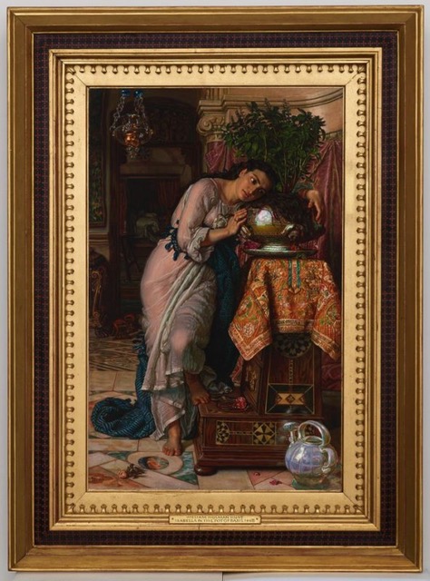 A standing woman in a diaphanous gown rests her head against a shiny pot holding green fronds in an elaborately decorated room.