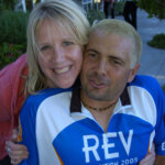 Person wearing a 2005 Revolution Ride Jersey getting a hug from someone else