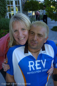 Person wearing a 2005 Revolution Ride Jersey getting a hug from someone else