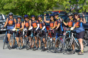 Team of 6 or 7 people all wearing a 2006 Revolution Ride Jerseys