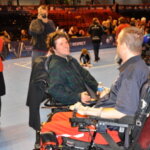 John shaking hands with Chris Finn