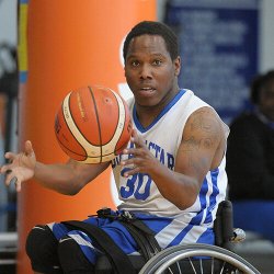 Lamile Perry catches ball on court