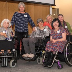 Women of Quadzilla smiling into camera